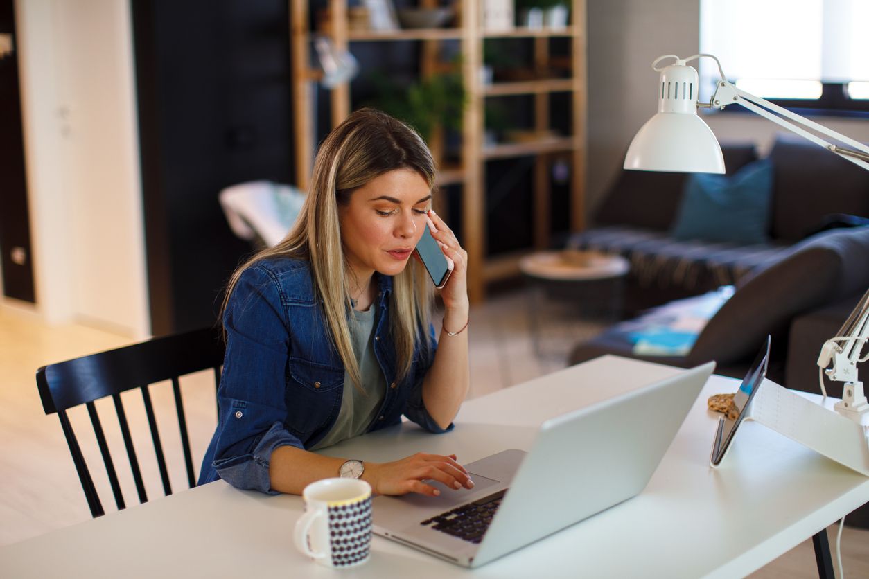 Woman working from home.