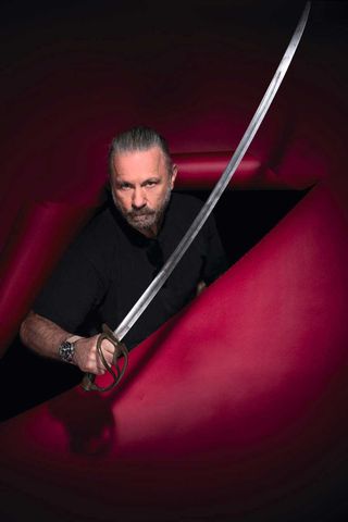 Bruce Dickinson branding a Samurai sword