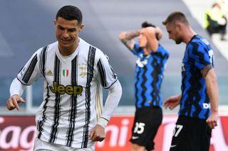 Cristiano Ronaldo celebrates after scoring for Inter against Inter in May 2021.