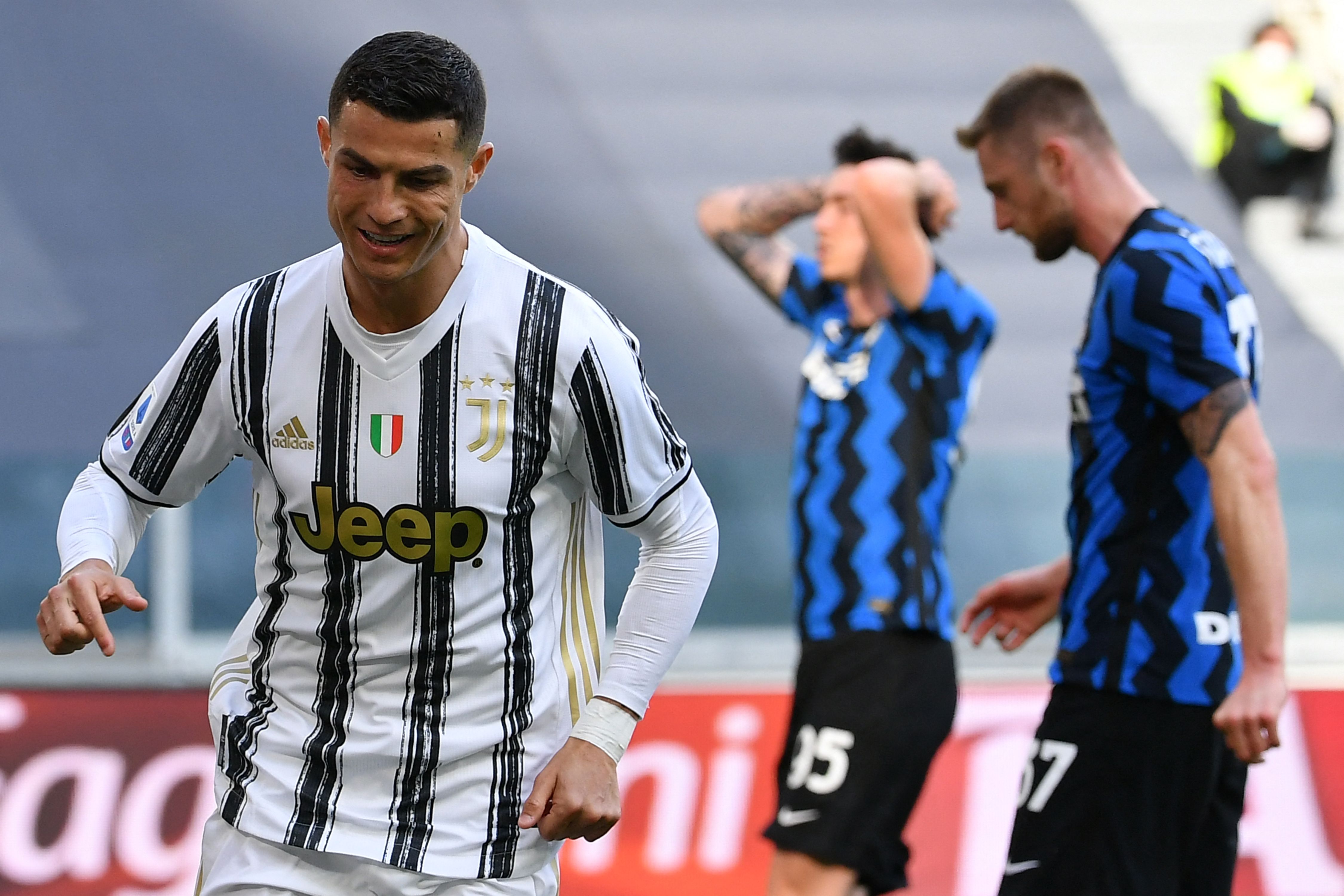 Cristiano Ronaldo celebrates after scoring for Inter against Inter in May 2021.