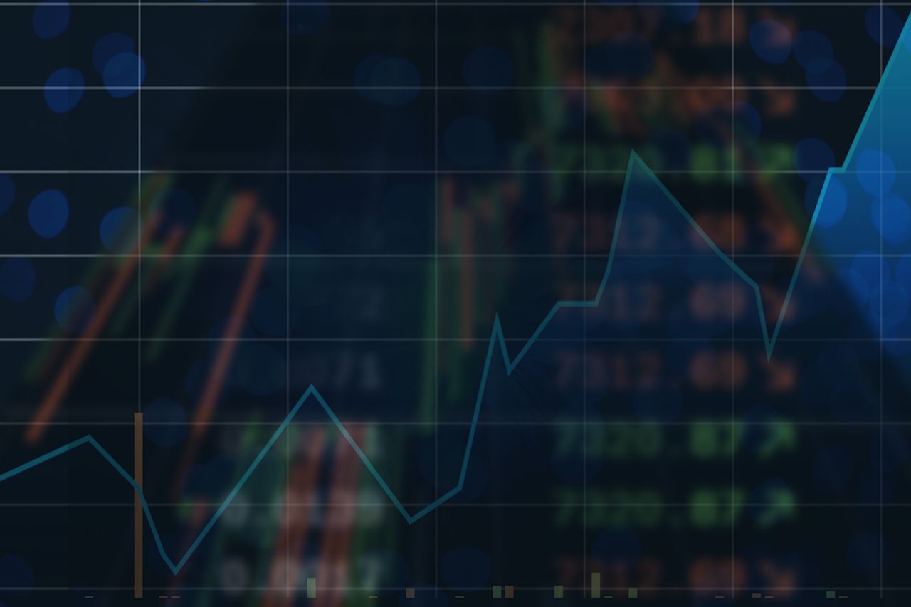 closeup of stock chart with blue moving average going higher