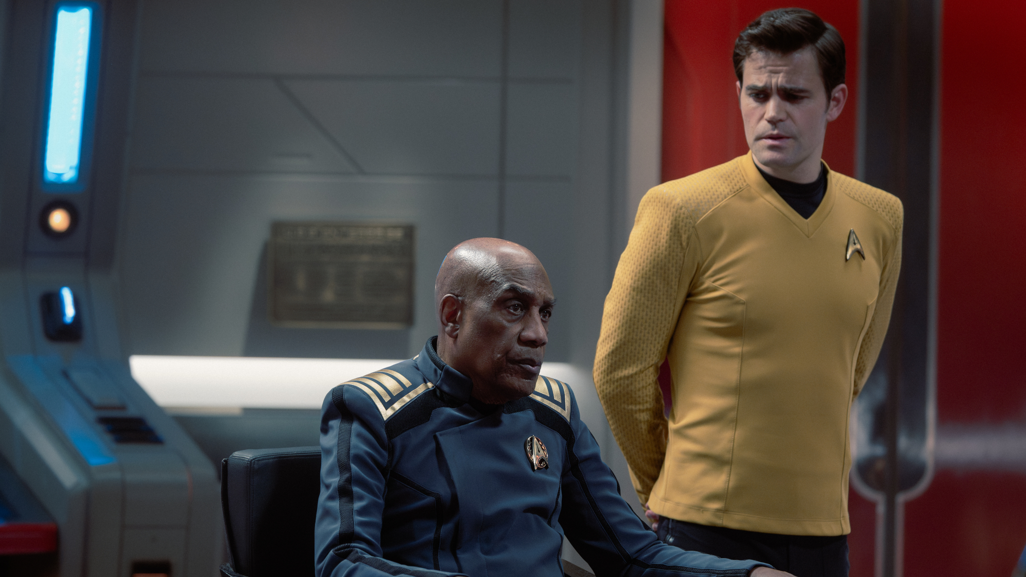 (L-R): Joe Mortin as Admiral Reeger and Paul Wesley as James T. Kirk in Star Trek: Strange New Worlds, episode 8, season 4