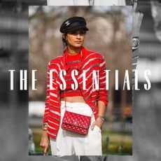 A woman wearing a Breton striped shirt. Text overlay reads, "The Essentials."