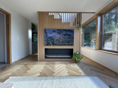 Wooden wall paneling with tv unit