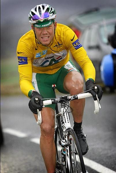 Looking ready for the fight: Thor Hushovd rides in the leader's jersey of the Paris-Nice.