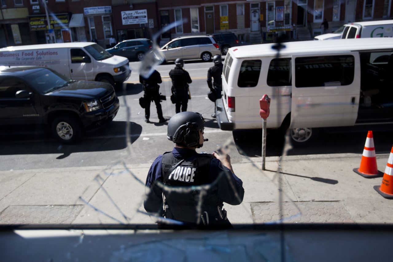 A police officer stands guard.