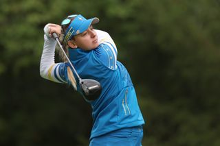 Emily Pedersen hits a tee shot with a driver