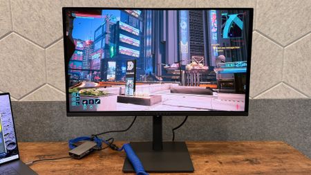 Alienware AW2726DM on a desk.