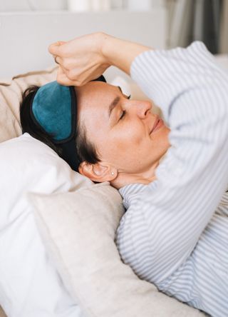 Woman wearing an eye mask