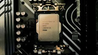 Intel Core i9-13900K sitting in motherboard socket