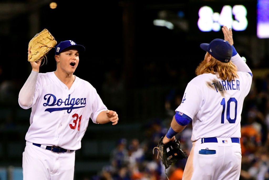 Joc Pederson and Justin Turner celebrate their Game 6 win.