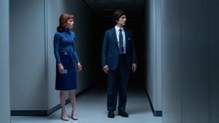 Britt Lower and Adam Scott (L-R) stand in a corridor in Apple TV Plus' "Severance" season 2