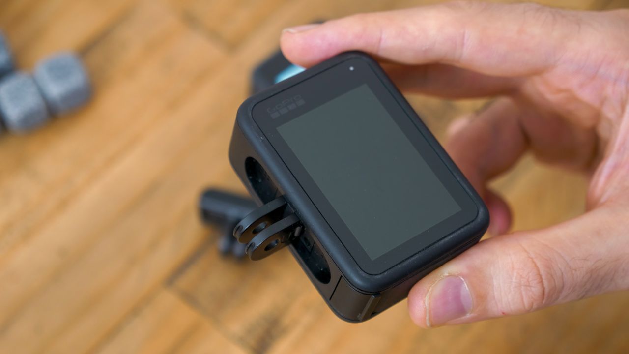 A photo of the GoPro Hero 11 Black and DJI Osmo Action 3