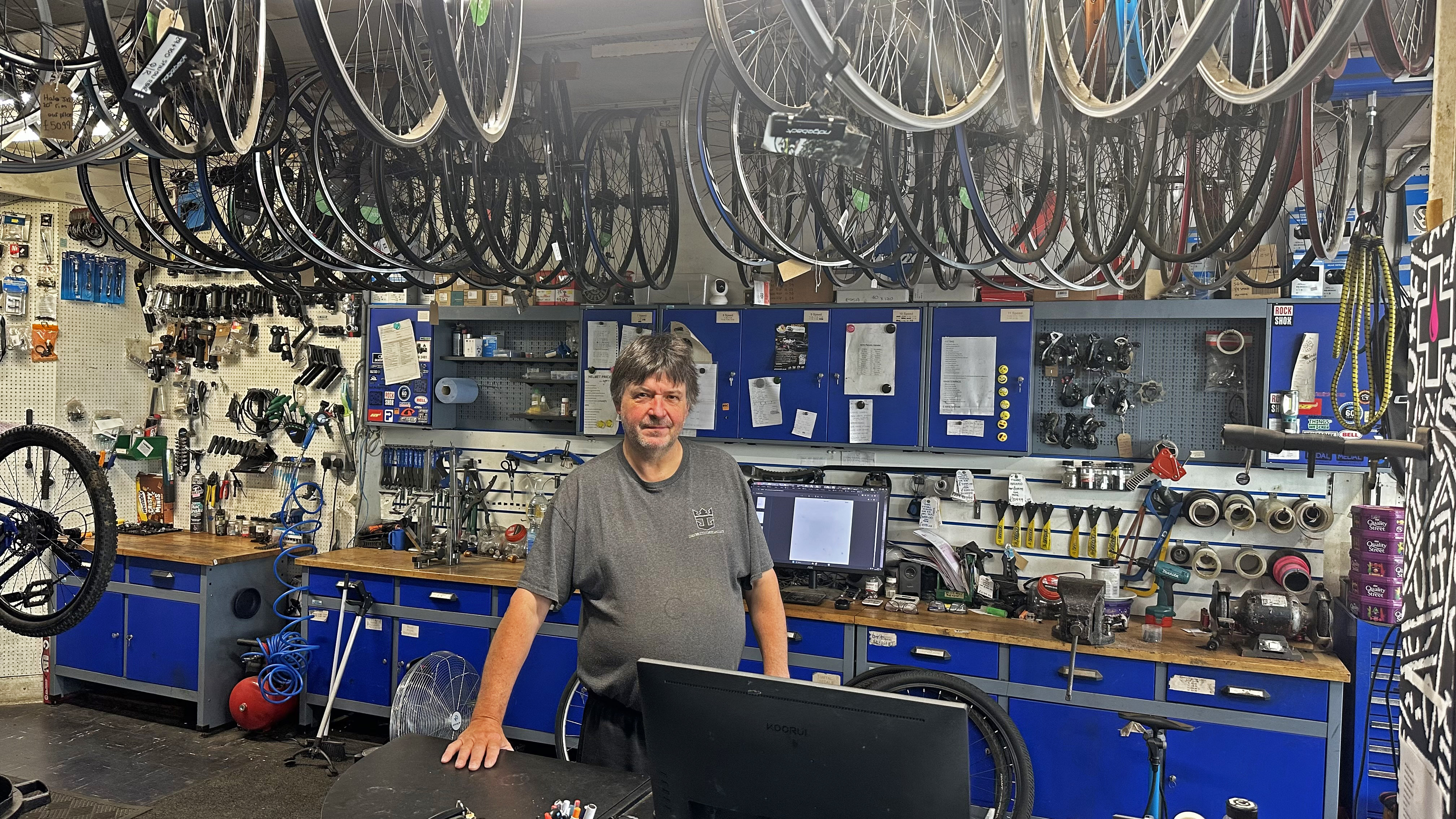 Sid Soanes, owner of Soanes Cycles in Devon, pictured inside his family run bike shop