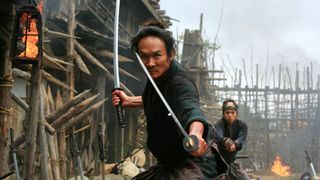 A samurai wields two swords in 13 Assassins