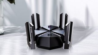 Reyee RG-E6 gaming router on a white counter top