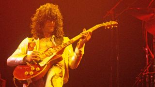 Jimmy Page onstage in 1977 with his red Les Paul