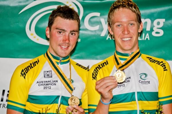 Leigh Howard and Cameron Meyer with some new jerseys and medals.