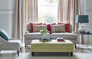 stripey Mikado curtains by James Hare in rainbow hues for a playful update.