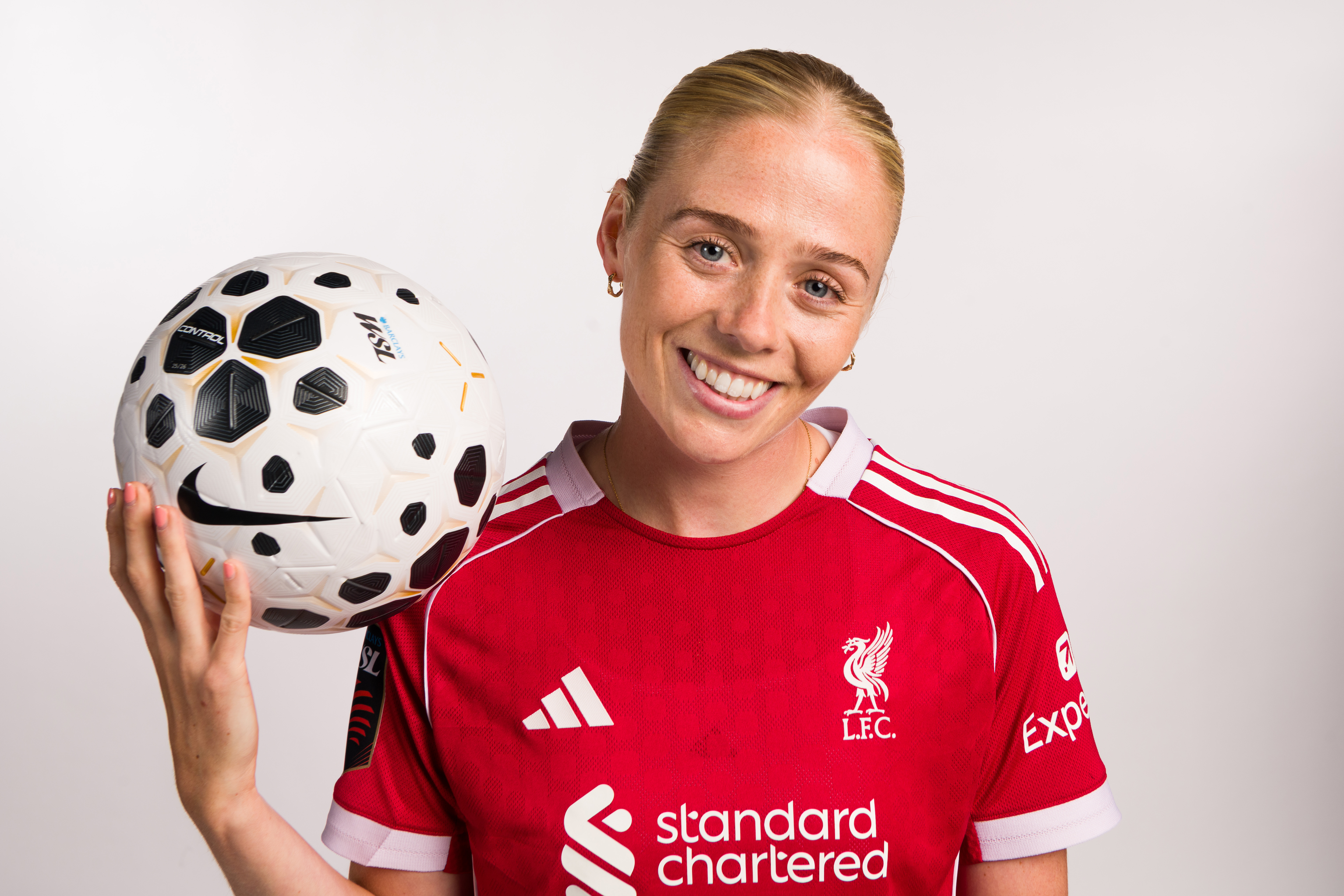 LIVERPOOL, ENGLAND - JULY 31: Grace Fisk of Liverpool FC poses for a portrait during the WSL Headshot 2025/2026 shoot day at Anfield on July 31, 2025 in Liverpool, England.