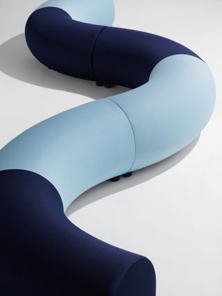 The collection’s informal seating comprises curved modular elements upholstered in high-tech sportswear fabrics