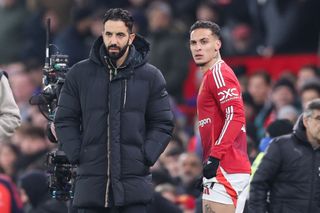 MANCHESTER, ENGLAND - JANUARY 16: Ruben Amorim, head coach of Manchester United, looks on with Antony of Manchester United during the Premier League match between Manchester United FC and Southampton FC at Old Trafford on January 16, 2025 in Manchester, England. (Photo by Alex Livesey - Danehouse/Getty Images)