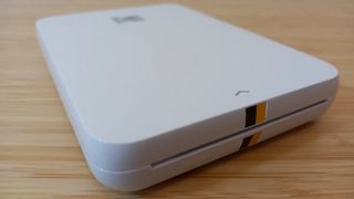 The Kodak Step Slim printer, on a desktop