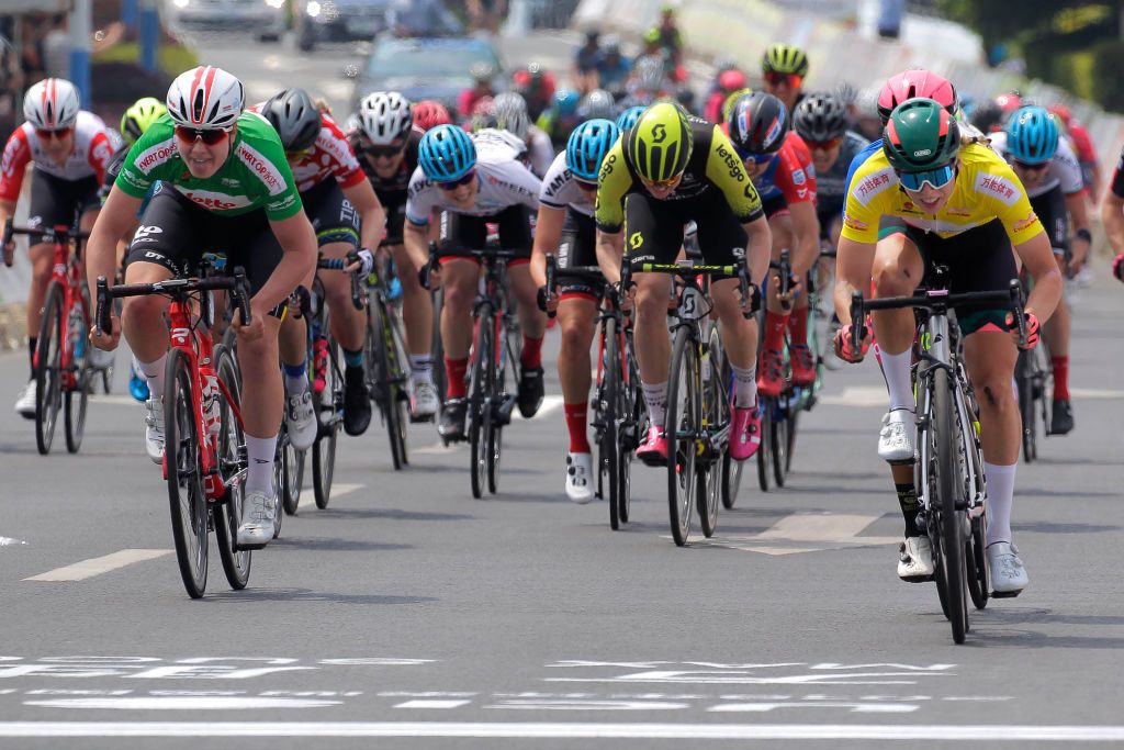 CHONGMING ISLAND CHINA MAY 10 Arrival Sprint Lorena Wiebes of The Netherlands and Team Parkhotel Valkenburg Yellow Leader Jersey Celebration Jutatip Maneephan of Thailand and Thailand Womens Cycling Team Blue Best Asian Rider Sarah Roy of Australia and Team Mitchelton Scott during the 13th Tour of Chongming Island 2019 Stage 3 a 1184km stage from Chongming Xingcheng Park to Chongming Xingcheng Park Chongming UCIWWT UCIWWT on May 10 2019 in Chongming Island China Photo by Hu ChengweiGetty Images