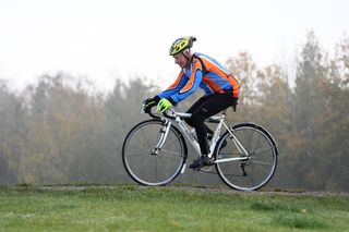 Image shows a person cycling