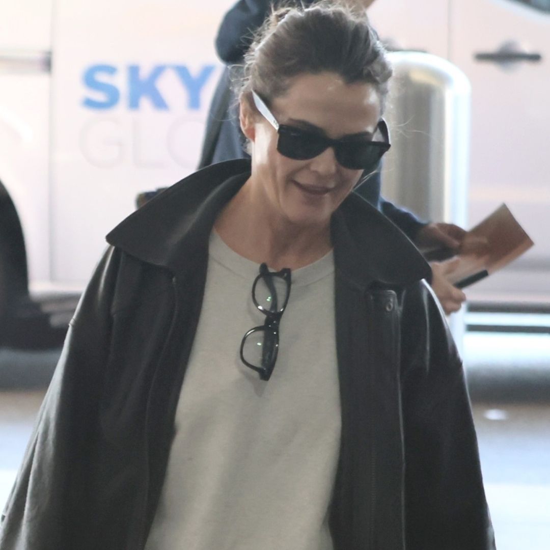 Keri Russell at the airport after the 2026 Golden Globes wearing chunky New Balance sneakers