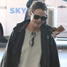 Keri Russell at the airport after the 2026 Golden Globes wearing chunky New Balance sneakers