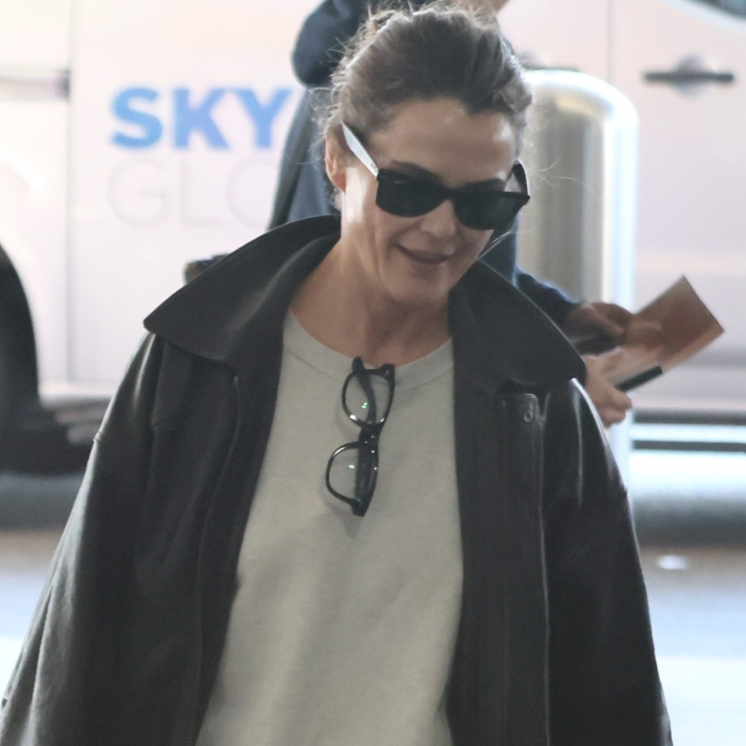 Keri Russell at the airport after the 2026 Golden Globes wearing chunky New Balance sneakers