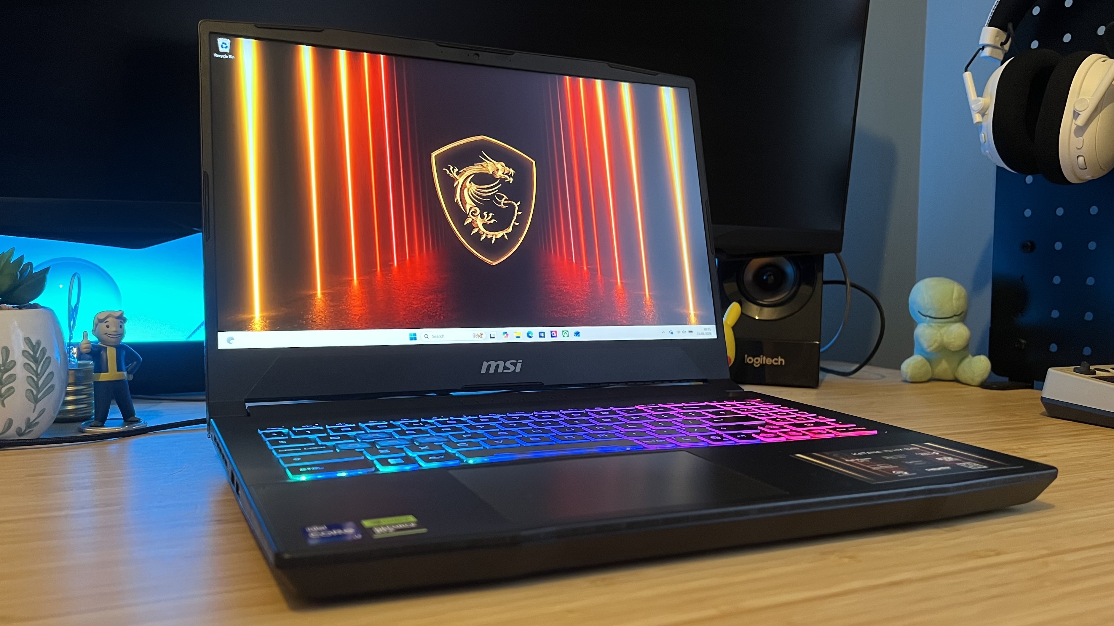 MSI Katana gaming laptop on a wooden desk