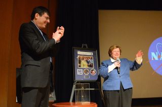Sen. Barbara Mikulski, seen here in 2016 with then-Goddard Space Flight Center director Chris Scolese, receives a framed collection of Hubble Space Telescope 25th anniversary memorabilia.