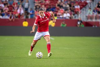 George Dobson #15 of Wrexham AFC dribbles the ball at Levi's Stadium on July 24, 2024 in Santa Clara, California.