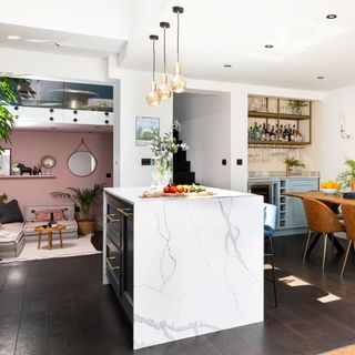 open plan kitchen with drawers and marble worktop