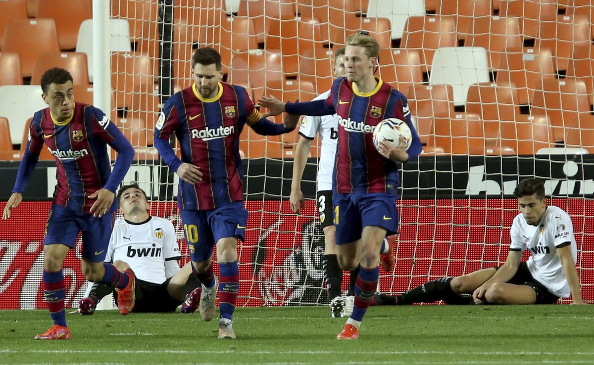 Barcelona’s Lionel Messi celebrates scoring his side’s first goal