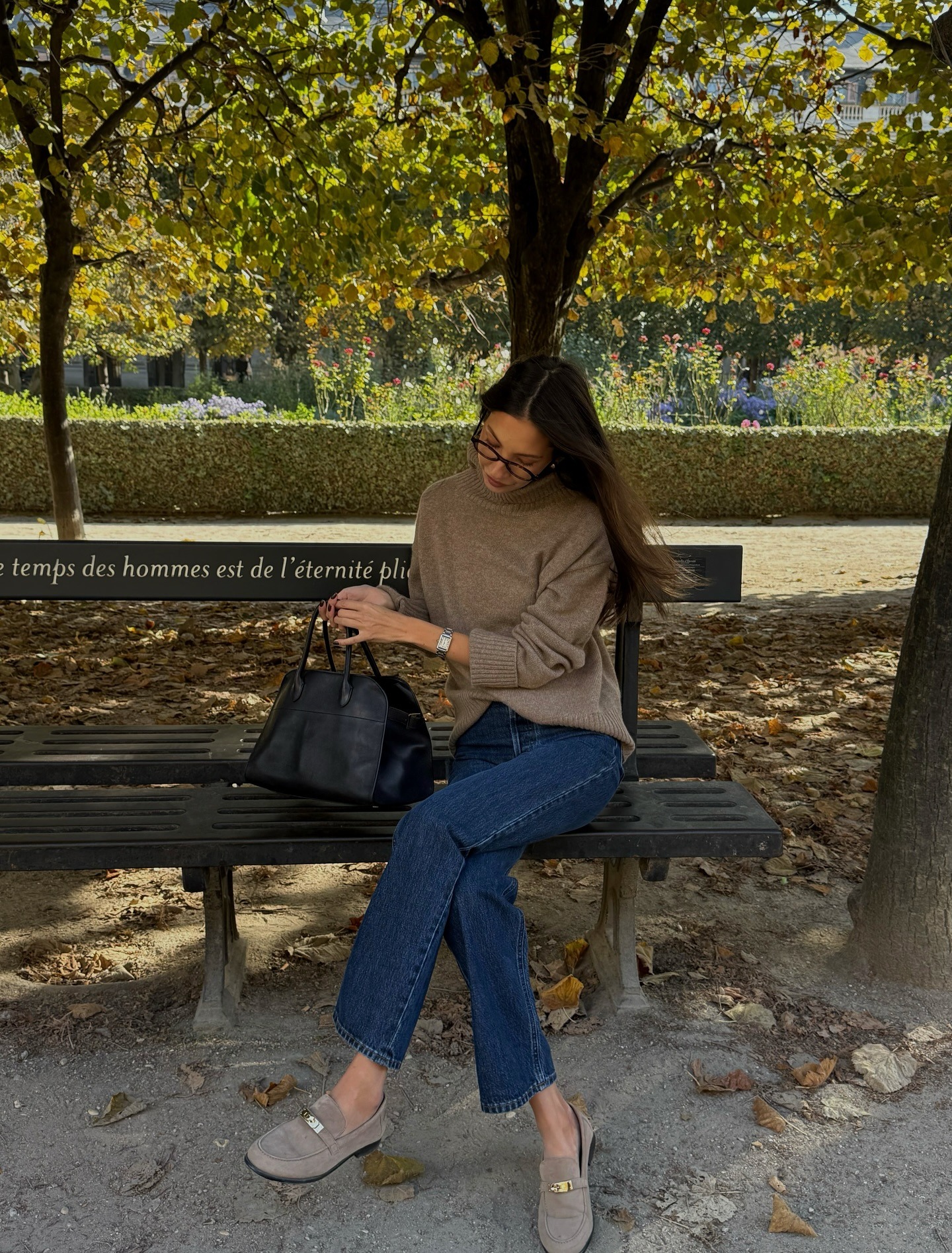 Woman wearing fall outfit with loafers.