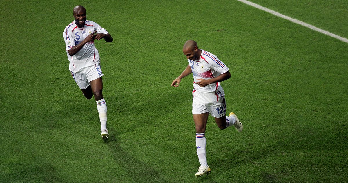 Thierry Henry #12 (R) of France is congratulated by teammate William Gallas, after scoring the opening goal during the FIFA World Cup Germany 2006 Quarter-final match between Brazil and France at the Stadium Frankfurt on July 1, 2006 in Frankfurt, Germany.