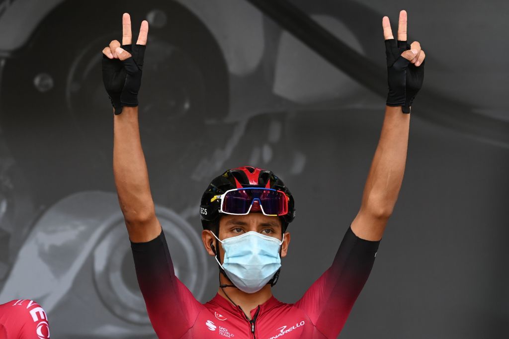 Team Ineos rider Colombias Egan Bernal wears a face protective mask as he flashes the V for victory prior to the first stage of the 72nd edition of the Criterium du Dauphine cycling race 2185 km between ClermontFerrand and SaintChristoenJarez on August 12 2020 Photo by AnneChristine POUJOULAT AFP Photo by ANNECHRISTINE POUJOULATAFP via Getty Images