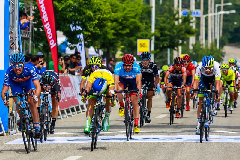 Patrick Bevin (Avanti Racing Team) and Caleb Ewan (Orica-GreenEdge) throw their bikes with Bevin claiming the win