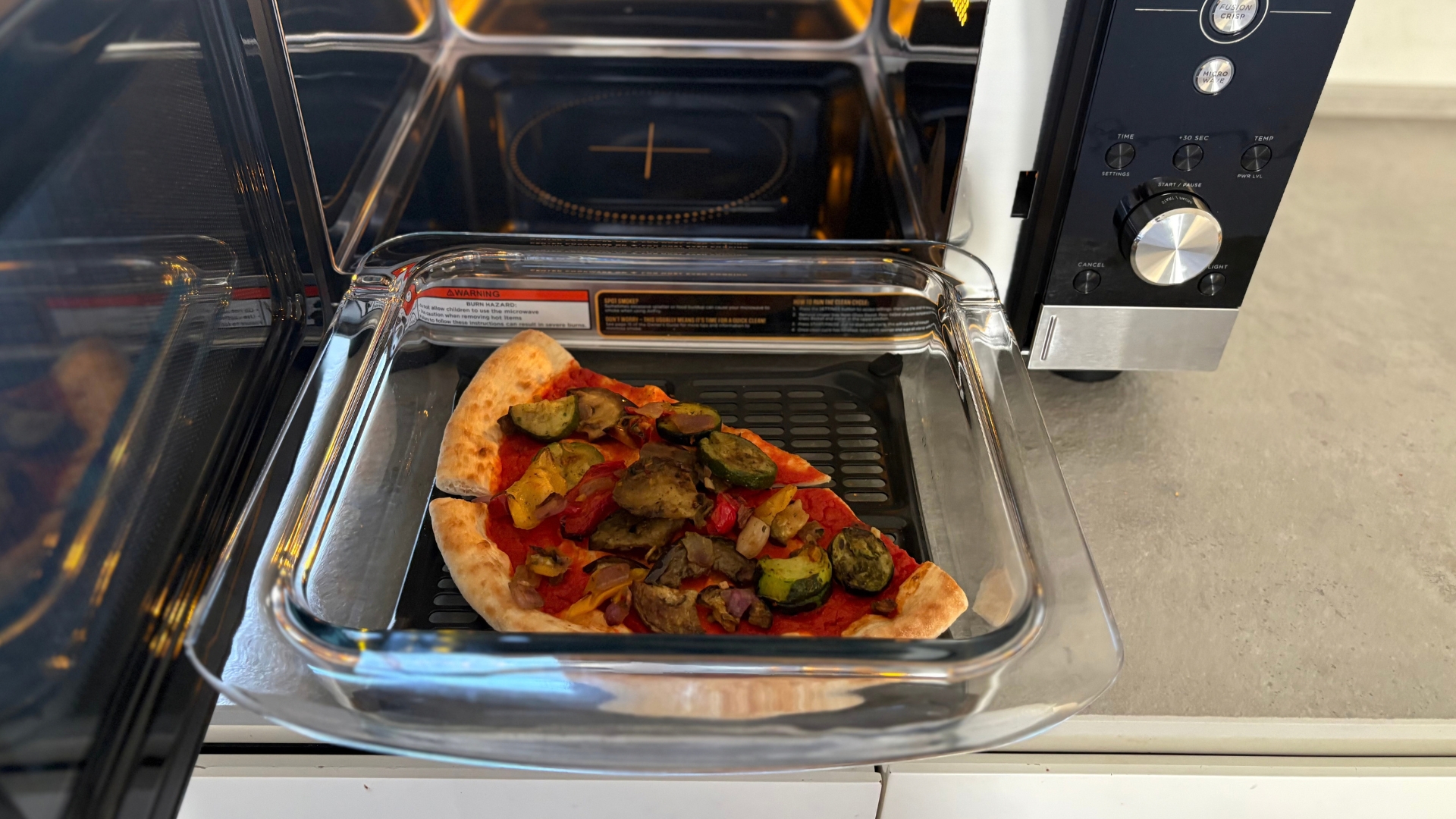 Testing the Ninja Crispi Microwave Air Fryer and Oven reheating pizza