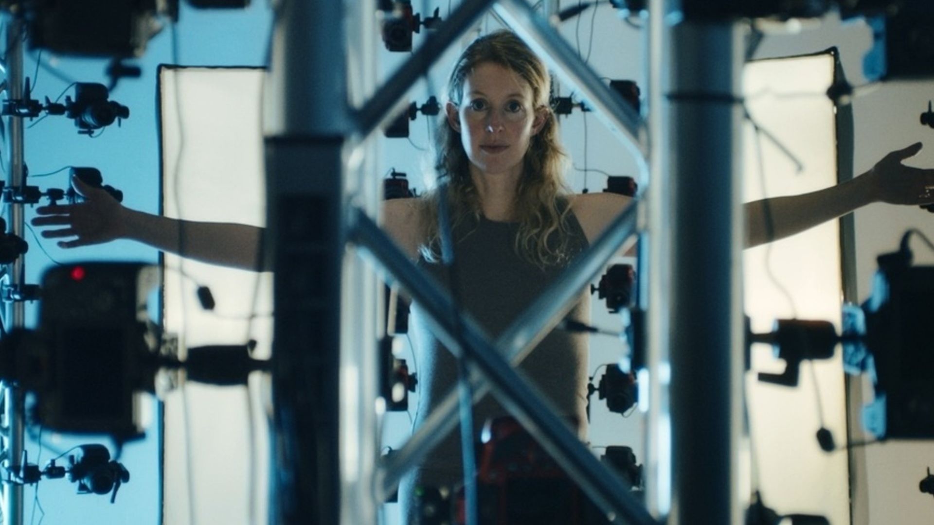 Elizabeth Holmes getting a full body scan from some kind of machine in You Can See Everything