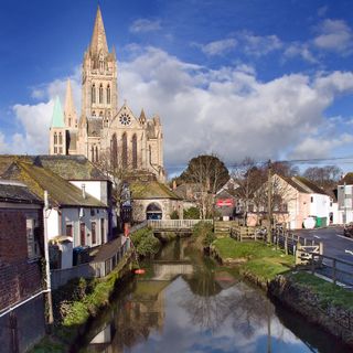 houses with road bridge and river