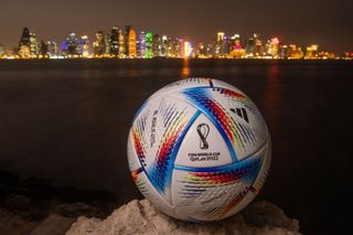 FIFA World Cup ball in front of Doha, Qatar, skyline