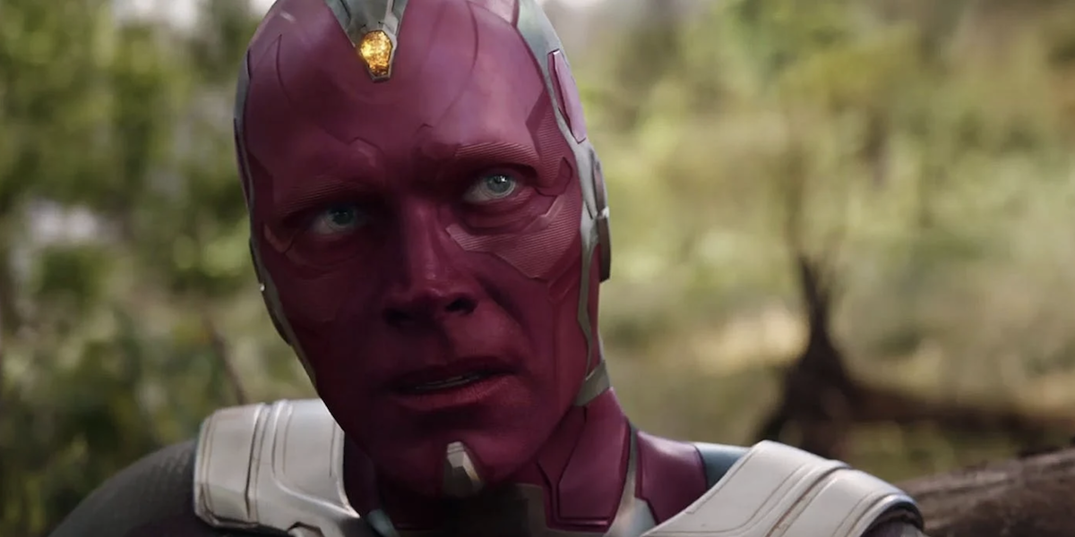 Vision sits on the ground in a forest in &#039;Avengers: Infinity War&#039;