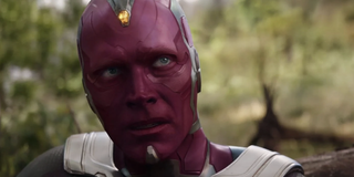 Vision sits on the ground in a forest in 'Avengers: Infinity War'