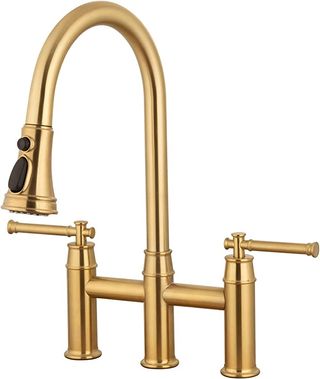 a brass kitchen tap