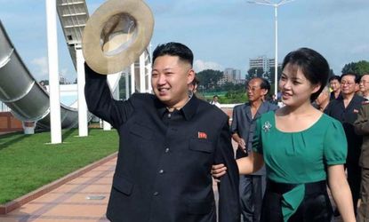 Kim Jong Un, accompanied by his wife Ri So Ju on July 25, shows off that "boyish charm" that made him The Onion's "Sexiest Man Alive" 2012.