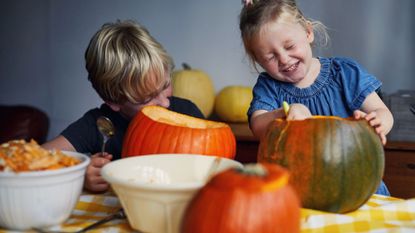 Halloween jokes illustrated by laughing children carving pumpkins